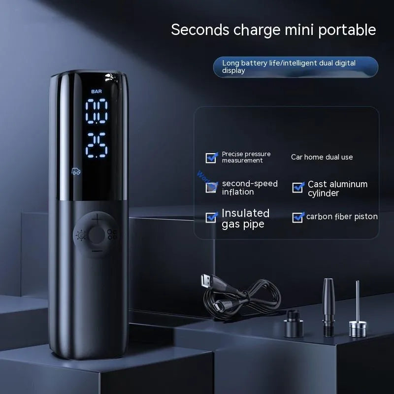 Black portable car air pump with tyre pressure gauge and inflation tube