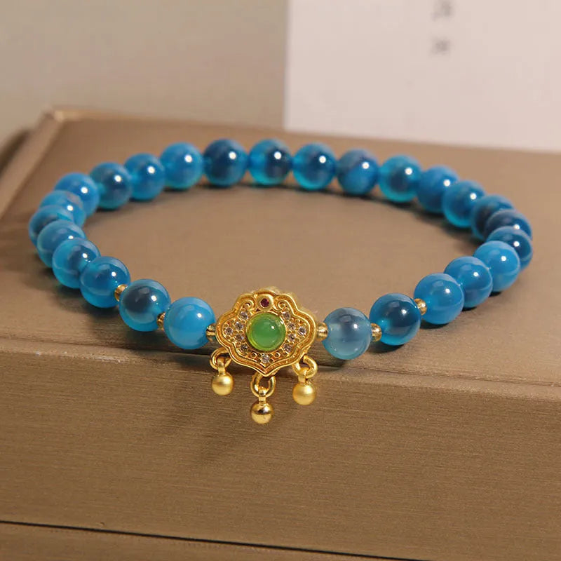 Women's blue sugar heart agate crystal pendant bracelet with safety lock clasp and rhinestone decorative elements