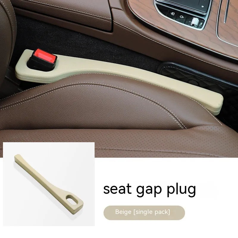 Polyurethane car seat gap filler strip in black, shown next to a vehicle centre console.