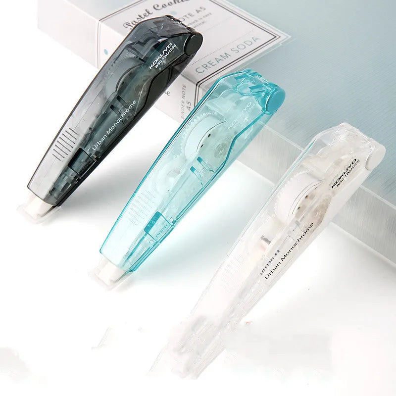 Refill correction tape dispenser in pastel blue, pink, yellow, transparent, black, and white colours.