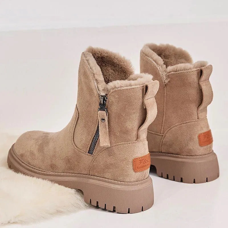 Women's black thick plush high-top snow boots with a side zipper and non-slip sole.