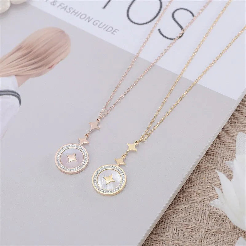 Gold titanium steel necklace with six-pointed star pendant and diamond accents on 42cm chain