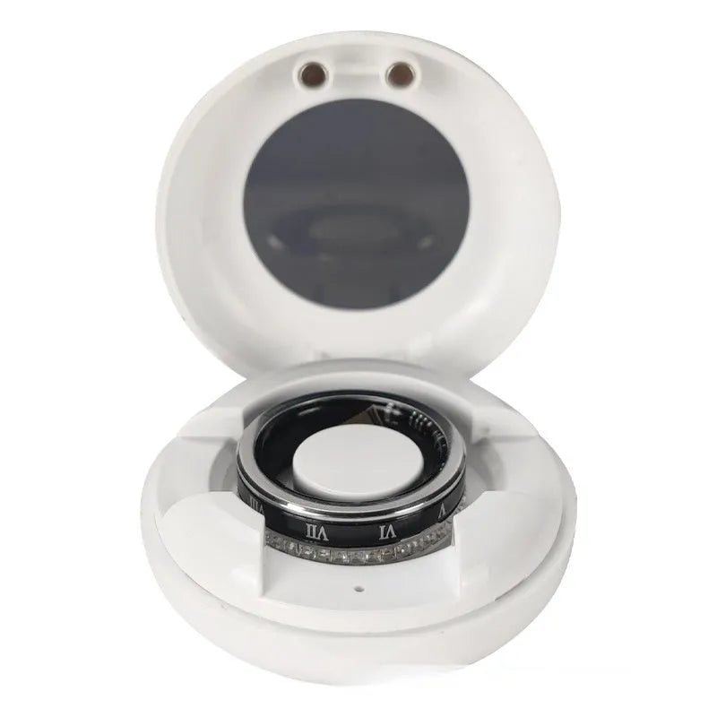 Gold and silver diamond inlaid smart ring for health monitoring on a finger.