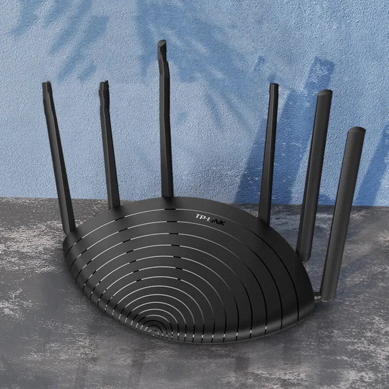 TL-WDR7661 AC1900 Gigabit wireless router shown in a home setting with network cable.