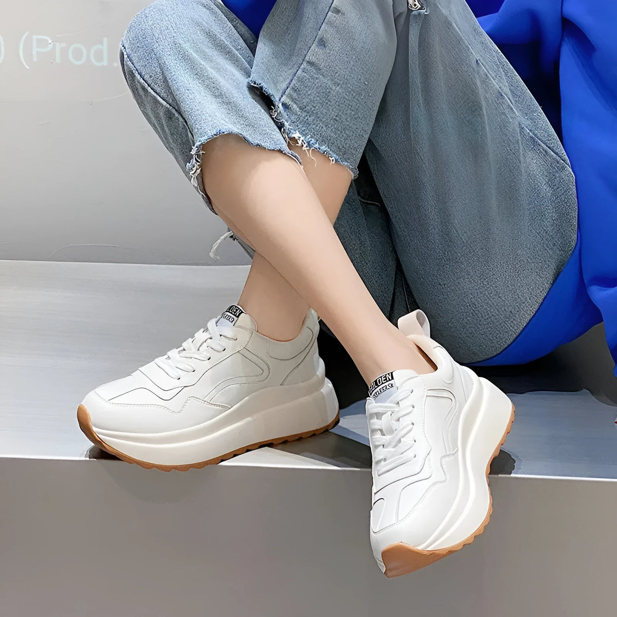 Women's white leather casual sports shoes with cross strap and English muffin heel detail
