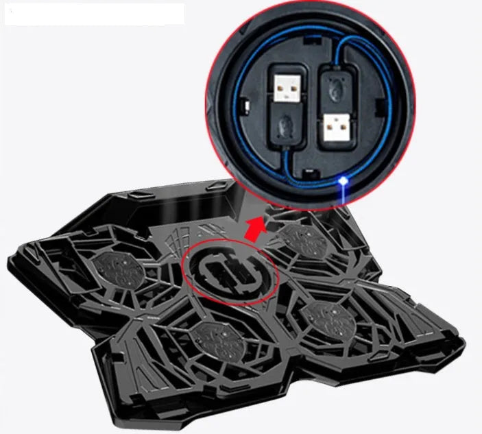 Blue LED computer cooling base with four fans and USB ports on desktop