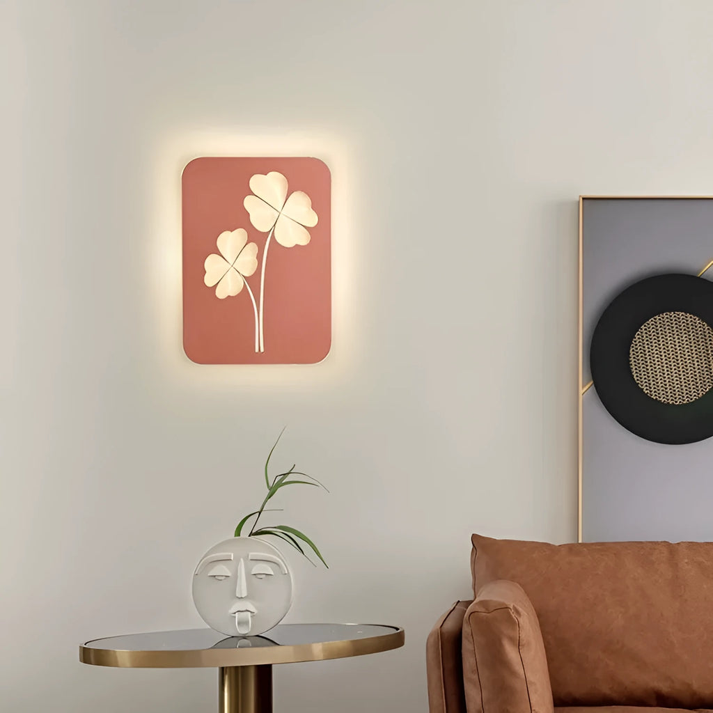 Modern cream bedside wall lamp with tricolour LED light and acrylic shade in love heart design