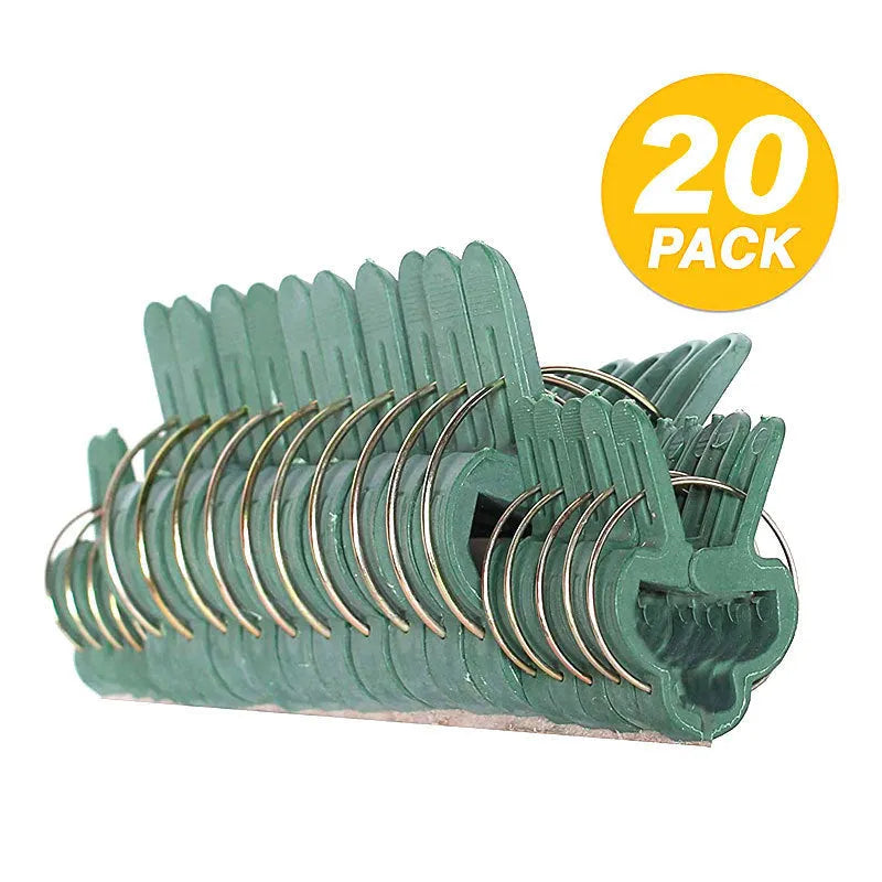 Green plastic and zinc plant fixing clips for supporting climbing tomatoes and beans