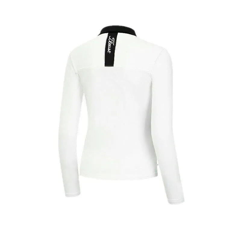 White slim-fit long sleeve women's golf top on a hanger