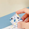 Super Clean Traceless brick design rubber eraser on a white background.