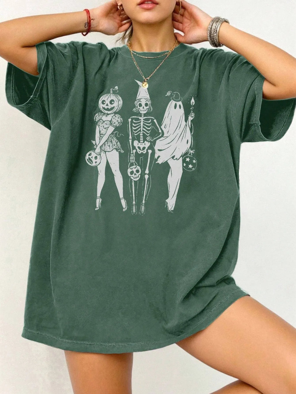 Loose fit cotton summer t-shirt in grey on a hanger, showing round neck and short sleeves.