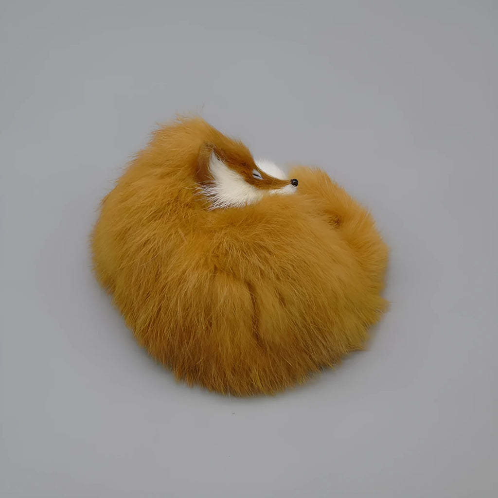 Artificial fox fur handicraft decoration in white, red, or yellow colours measuring 15cm with car accessory