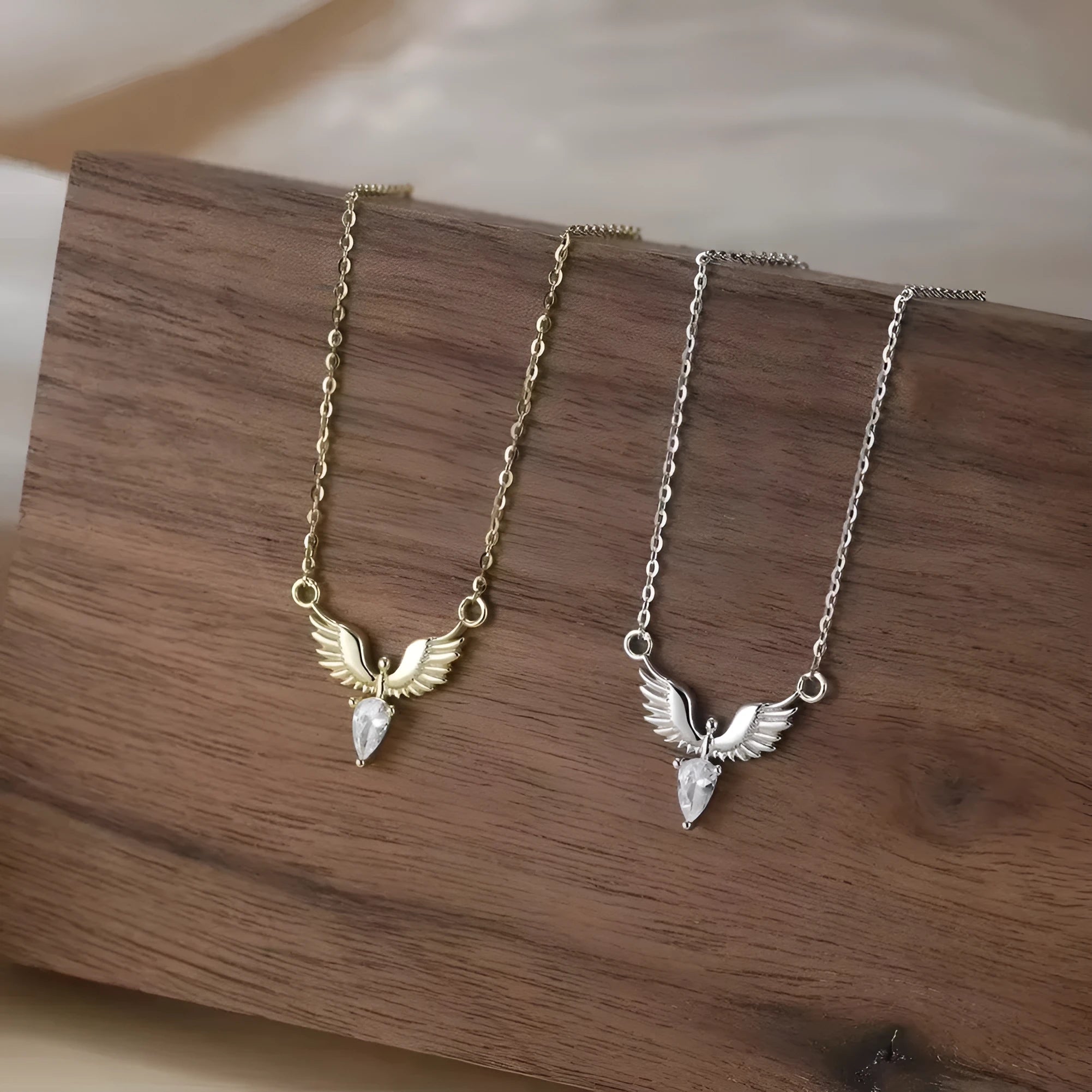 Women's silver eagle pendant necklace with adjustable O-ring chain in white gold or yellow gold finish