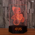 Glowing blue dolphin 3D LED table lamp with remote control on a wooden surface.