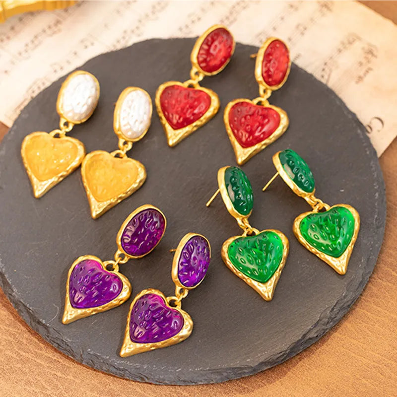 Silver needle pleated oval love heart stud earrings in purple, red, green, and yellow white colours with stainless steel posts.