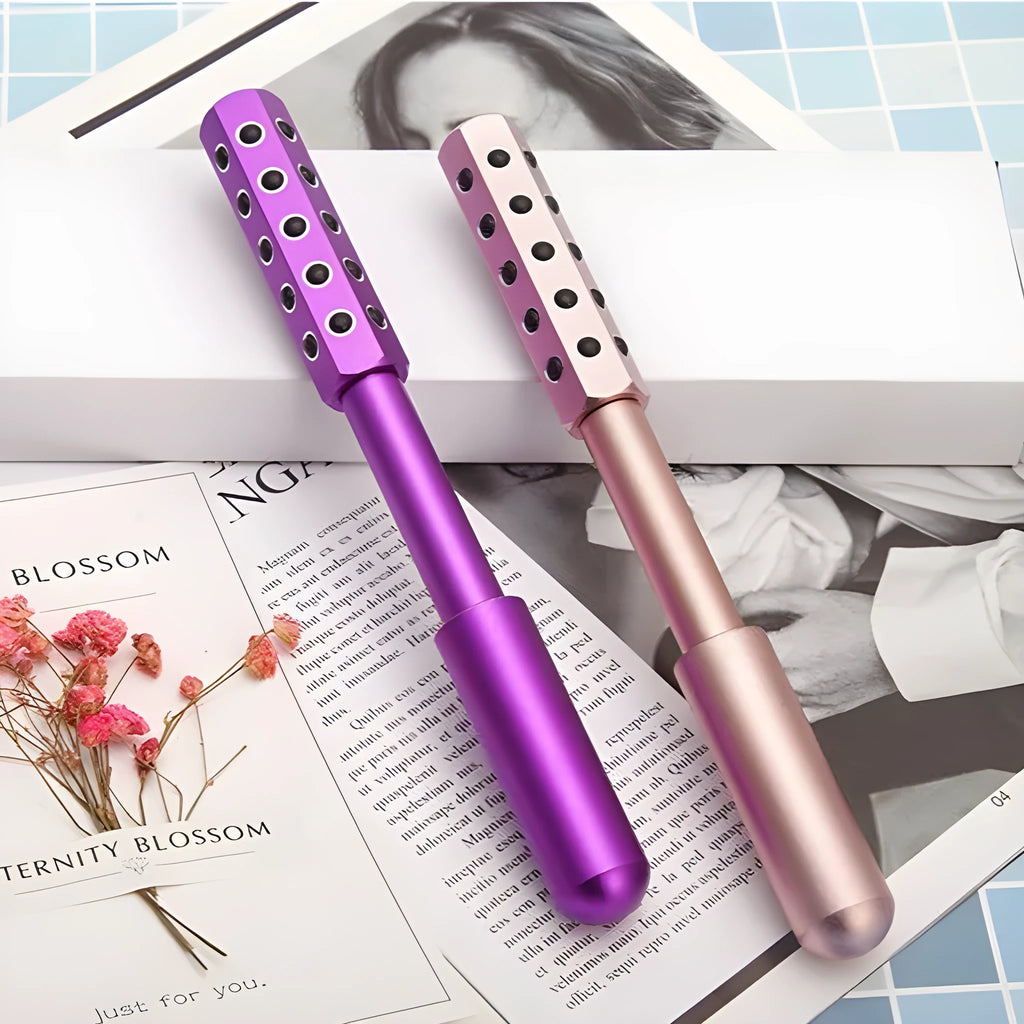 Germanium particles roller massage instrument in purple colour showing 24 rotating massage heads
