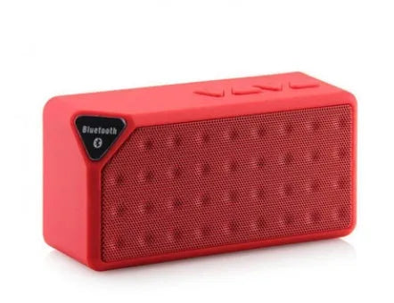 Cannon X3 mini cube-shaped wireless Bluetooth speaker in one of five colours: black, blue, green, red, or yellow.