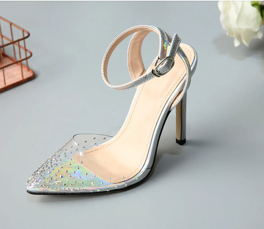 Women's pointed toe stiletto heel sandals with a PVC upper, shown on a size chart.