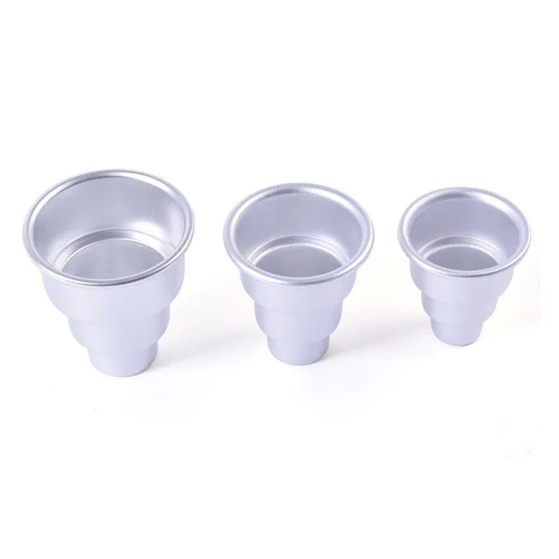 Set of three silver aluminium alloy round cake moulds in large, medium, and small sizes.