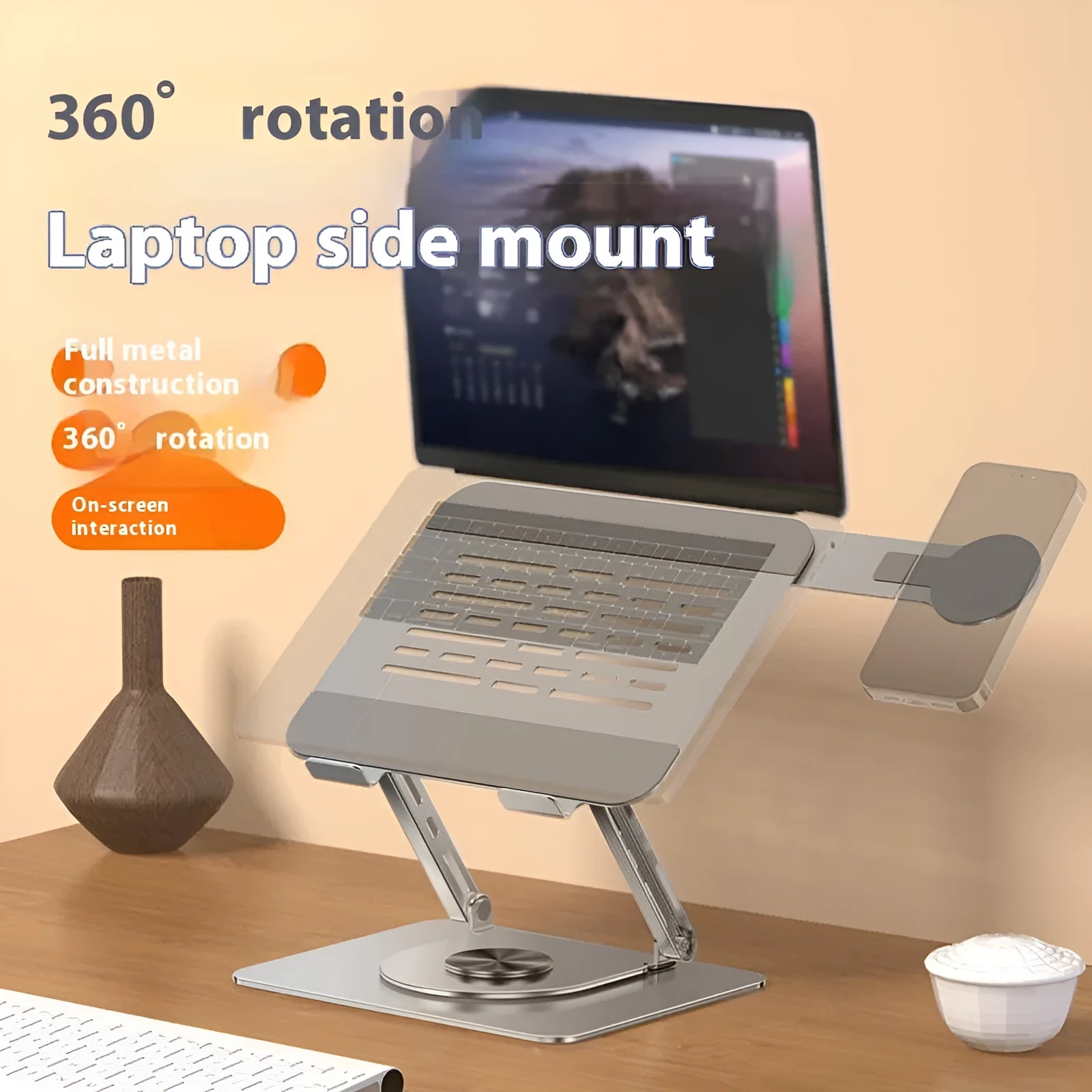 Silver carbon steel laptop stand with a side-mounted magnetic phone holder rotated to the front.