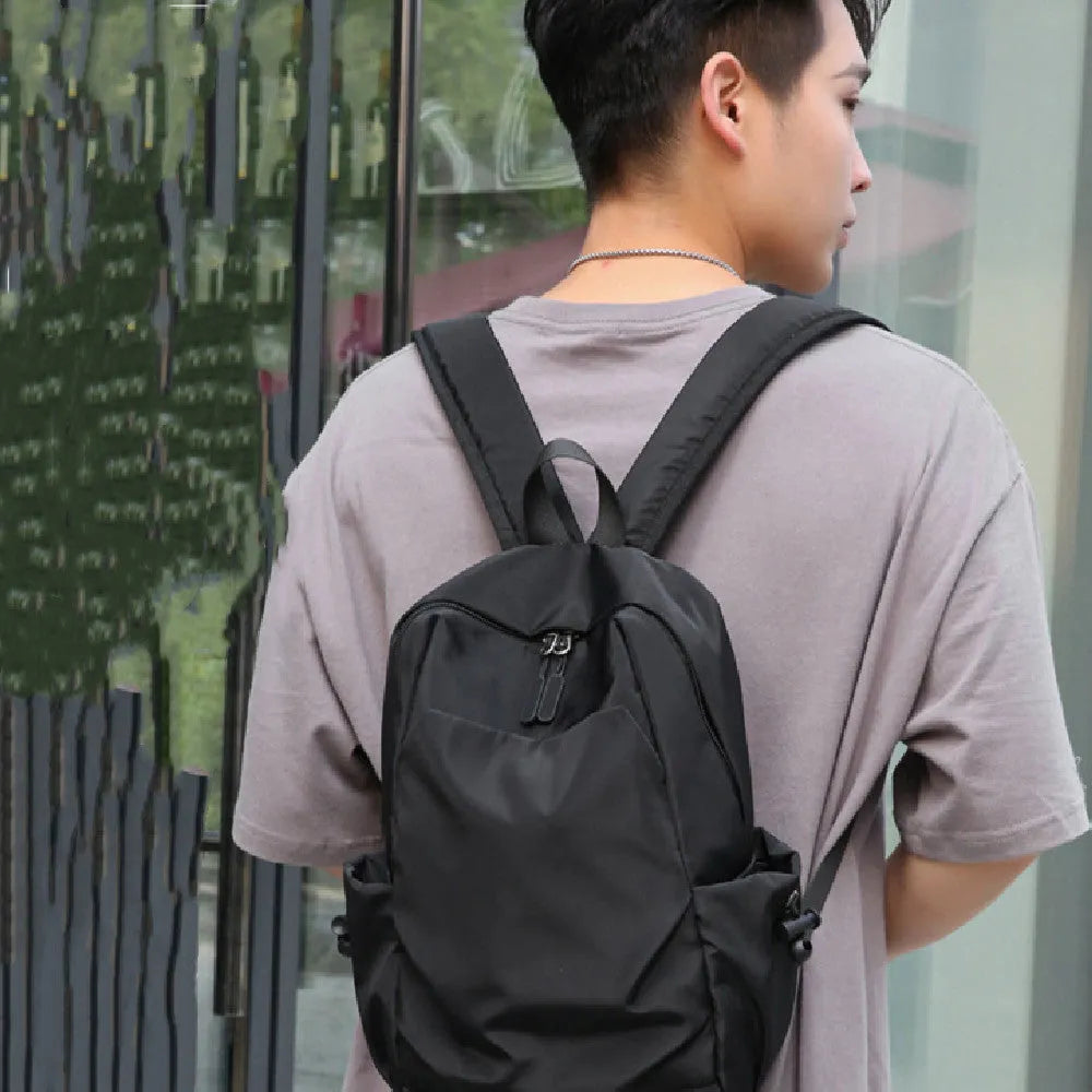 Oxford cloth backpack for men in black or gray with breathable design and polyester cotton lining