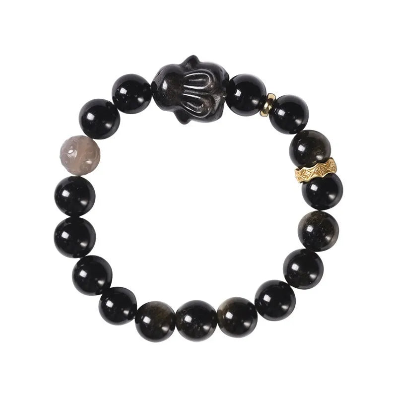 Handmade grey agate and silver lying rabbit charm bracelet on wrist, showing 10mm bead size option.