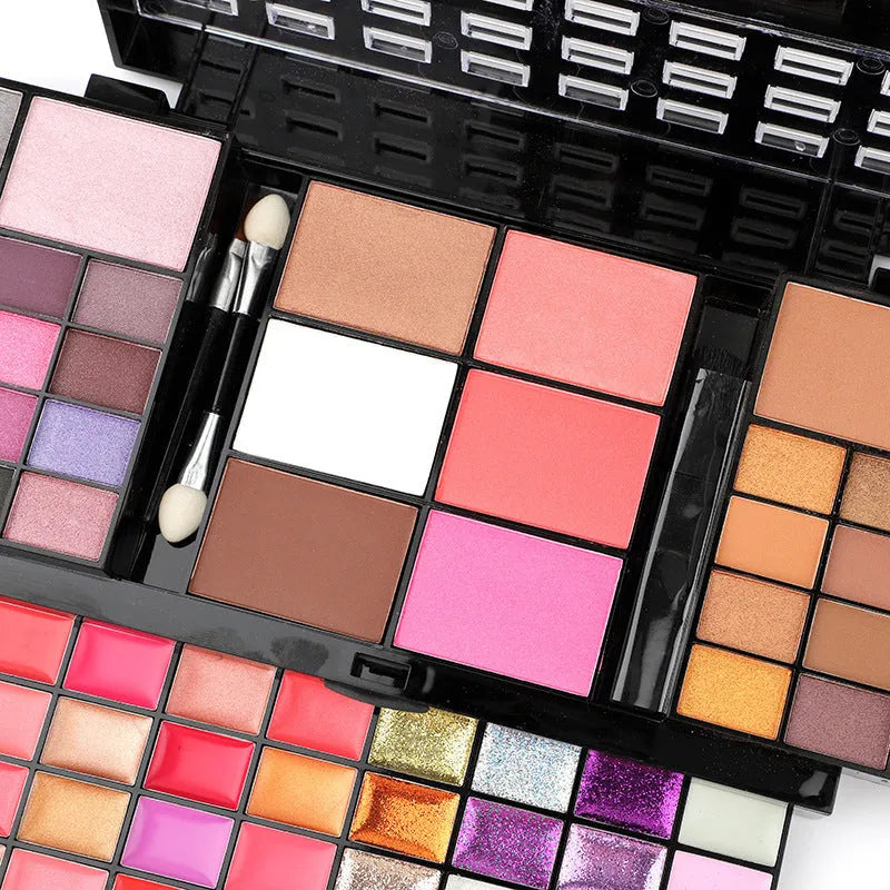 74 colour makeup combination palette open showing eyeshadows, lip glosses, and brushes