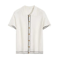 White women's short sleeve cardigan with dark contrast lapels on the collar.