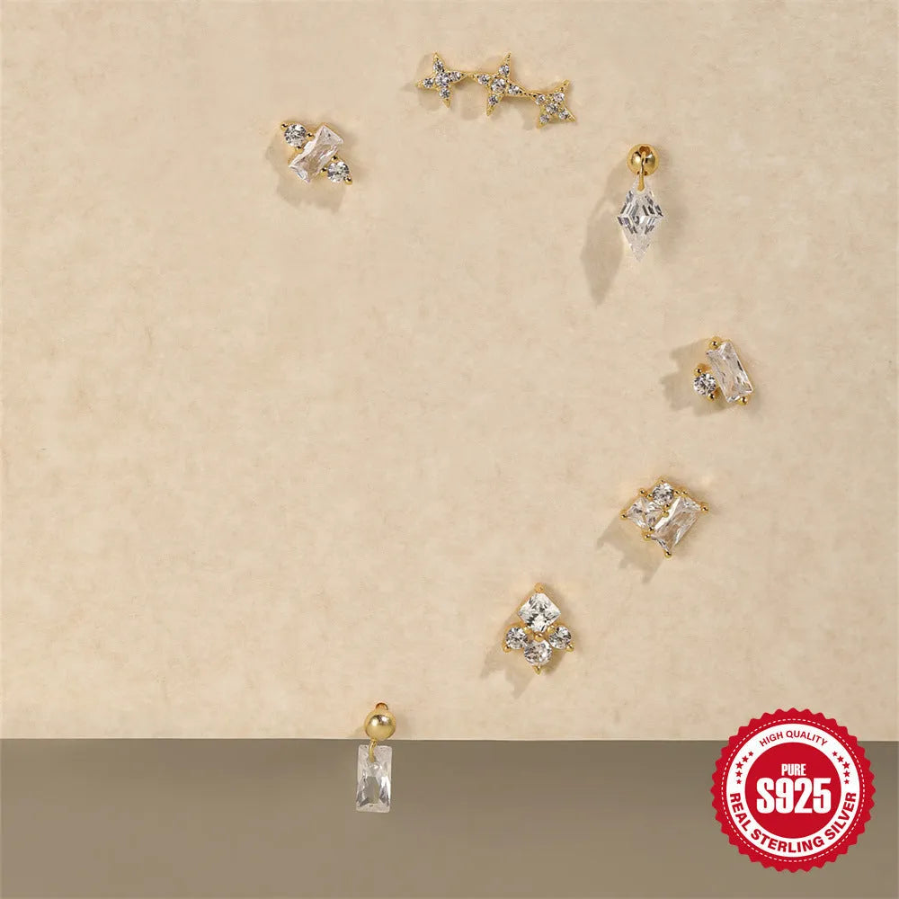 S925 sterling silver flower-shaped stud earrings with gravel texture in a gold electroplated finish.