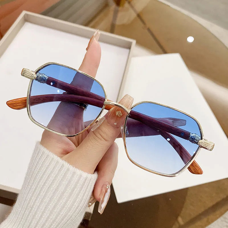 Women's frameless trim glasses with wood grain effect and gold alloy frame in a box style.