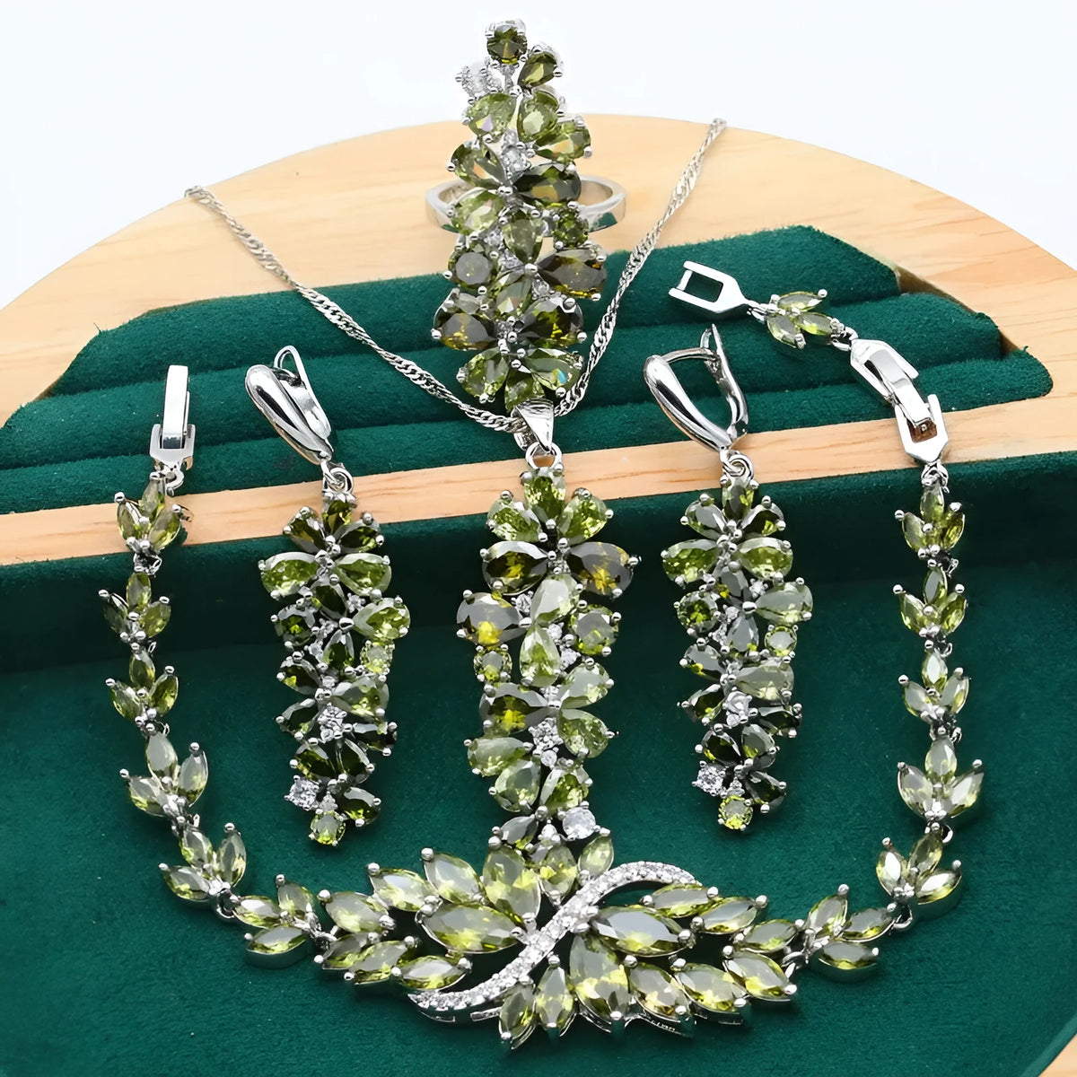 Retro copper jewellery set with botanical patterns including necklace, earrings, ring and bracelet pieces