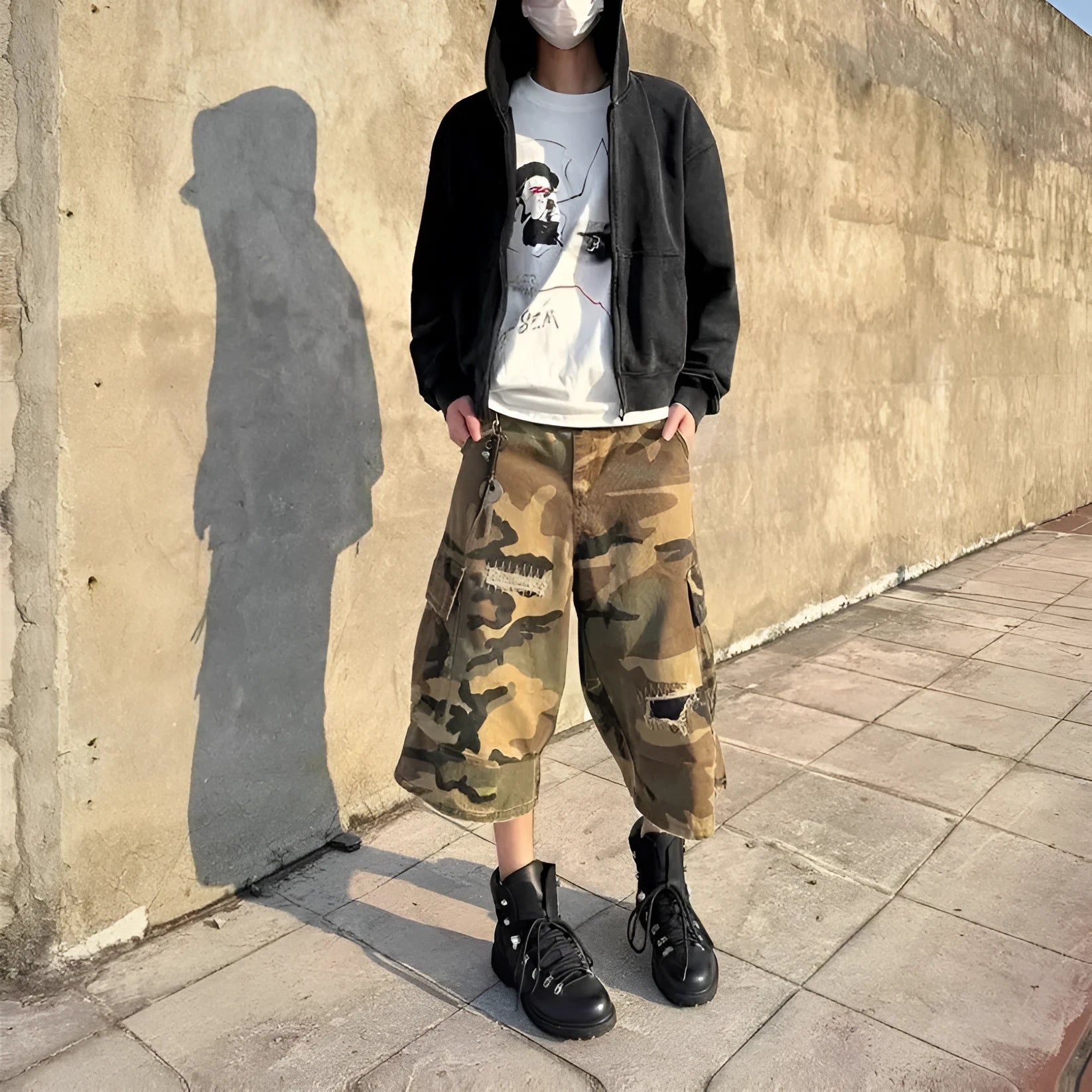 Men's camouflage cropped jeans with ripped detailing and loose straight leg fit