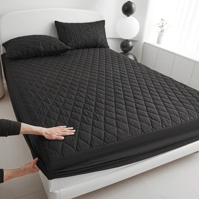 Diamond lattice quilted waterproof mattress protector in bamboo fibre, shown in a solid colour.