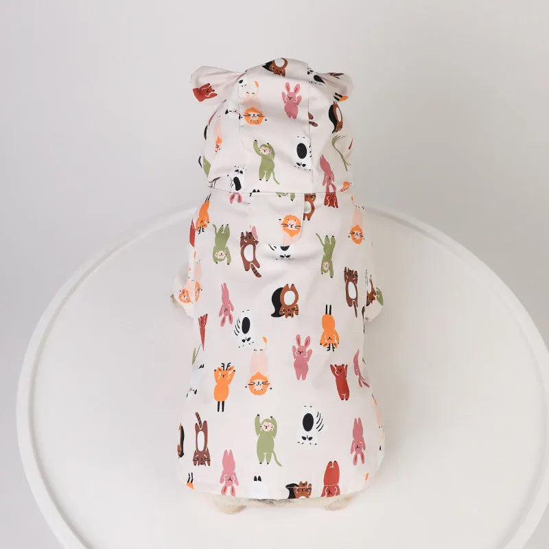 Beige cartoon dog raincoat with waterproof PU coating shown in small animal or cat head design