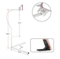 Black mobile phone bed bracket with overhead shelf mounted beside bed for hands-free viewing