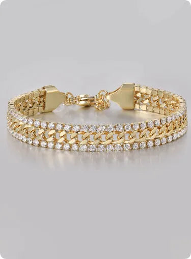 Gold plated tennis bracelet for men and women with stone inlay on a wrist.