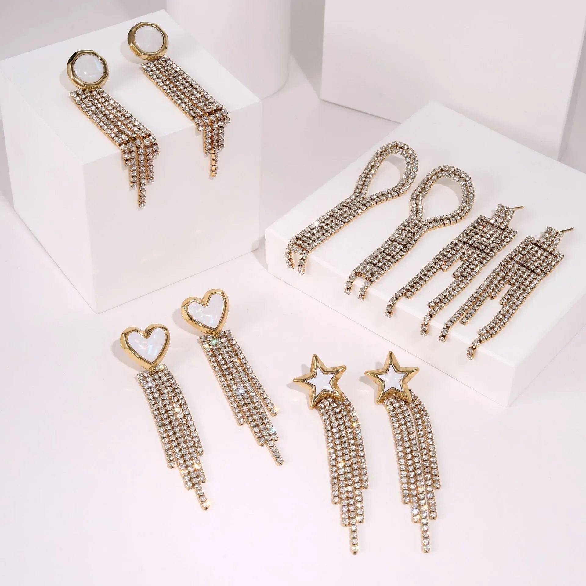 Women's stainless steel earrings with 18K gold electroplating in heart and star shapes