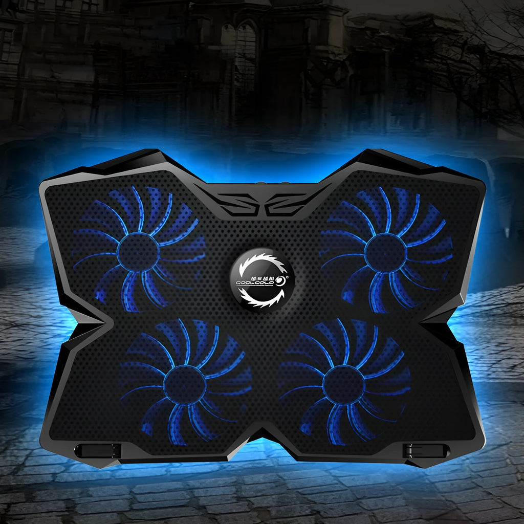 Blue LED computer cooling base with four fans and USB ports on desktop
