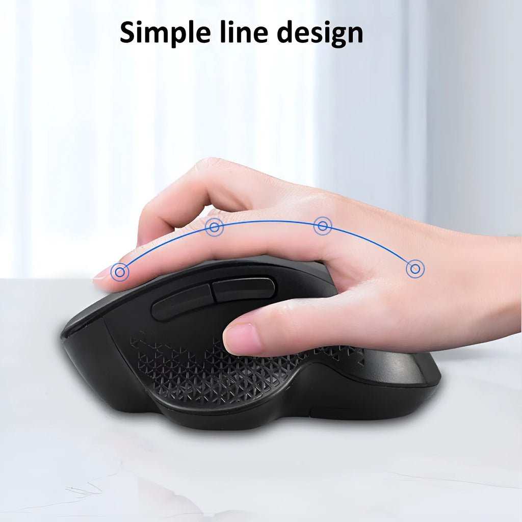 Grey and black wireless computer mouse with USB charging cable on a white box