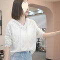 Women's blue crochet hooded longsuit undershirt with hollow knit pattern and long sleeves.