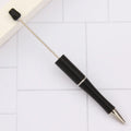 Ballpoint pen with colourful spinning plastic beads on barrel, shown in a gradient purple finish.