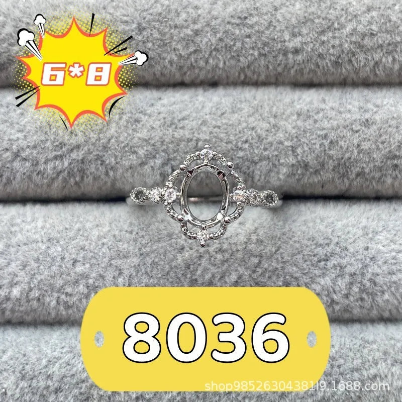 Oval denier ring ornament with open mouth design, 6x8mm stone and five-pointed star detail