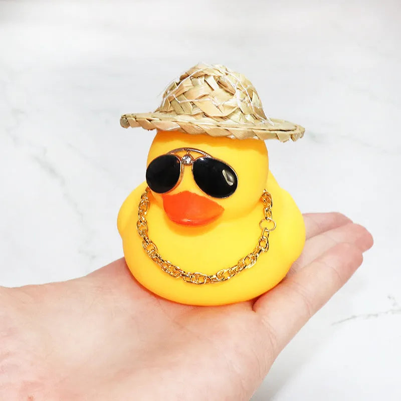 Yellow duck wearing straw hat car ornament with matte finish and included base glue