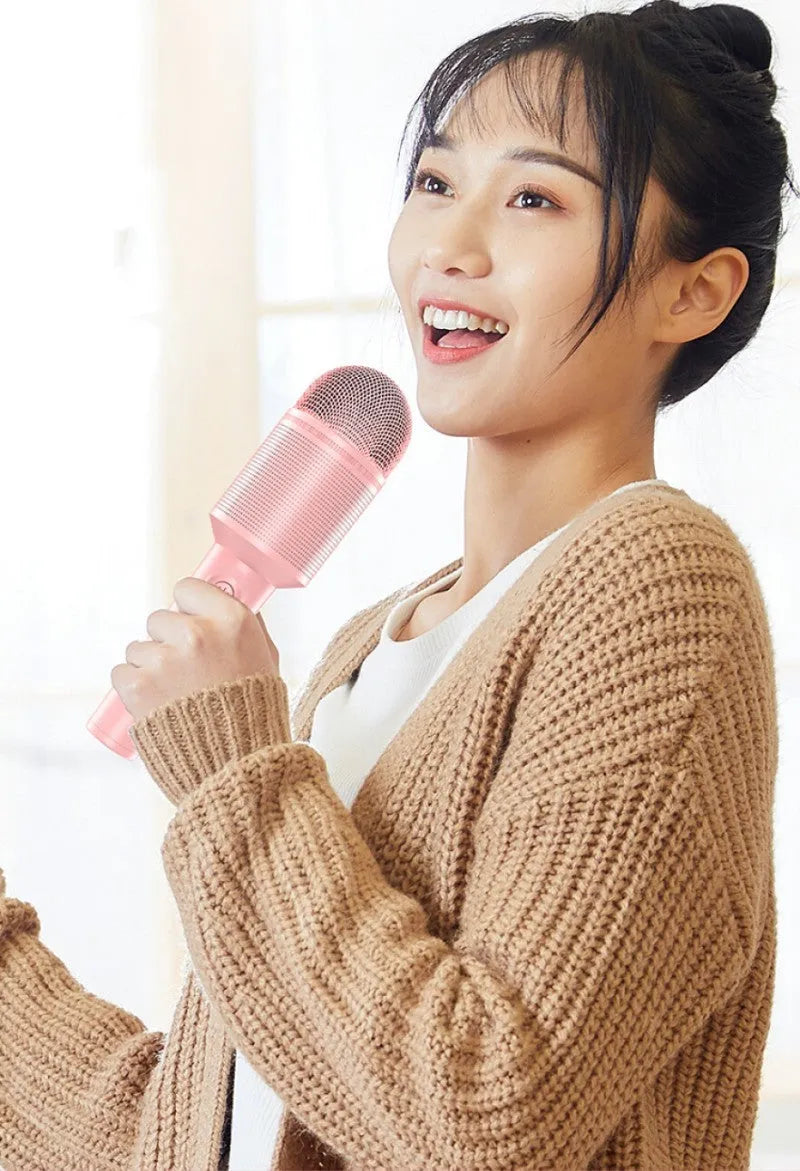 Wireless Bluetooth karaoke microphone in pink, blue, or green colour with USB port