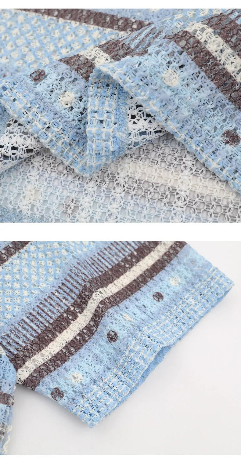 A blue men's casual printed shirt with short sleeves and a loose fit.