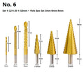 High speed steel step drill bit and centre punch set in metal case with size markings from 3mm to 32mm