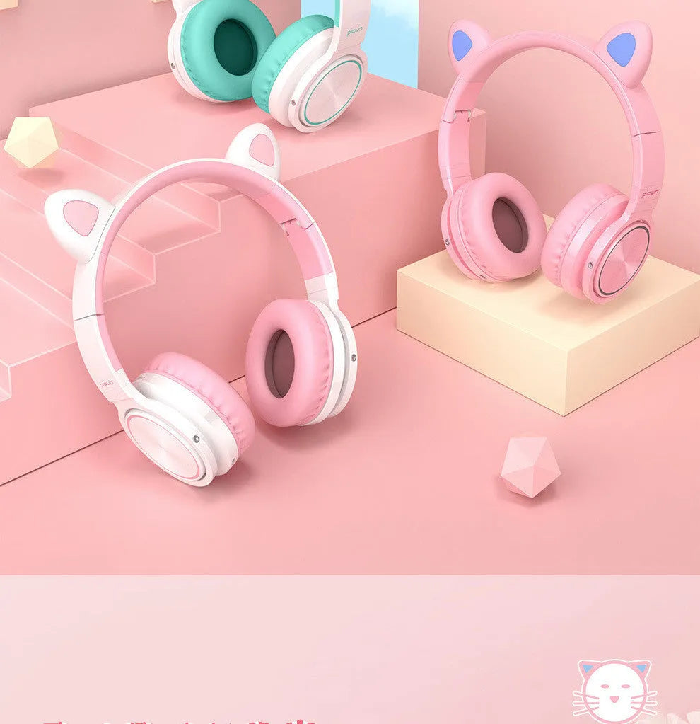 Pink and white wireless Bluetooth headset with head-mounted design and 40mm speakers