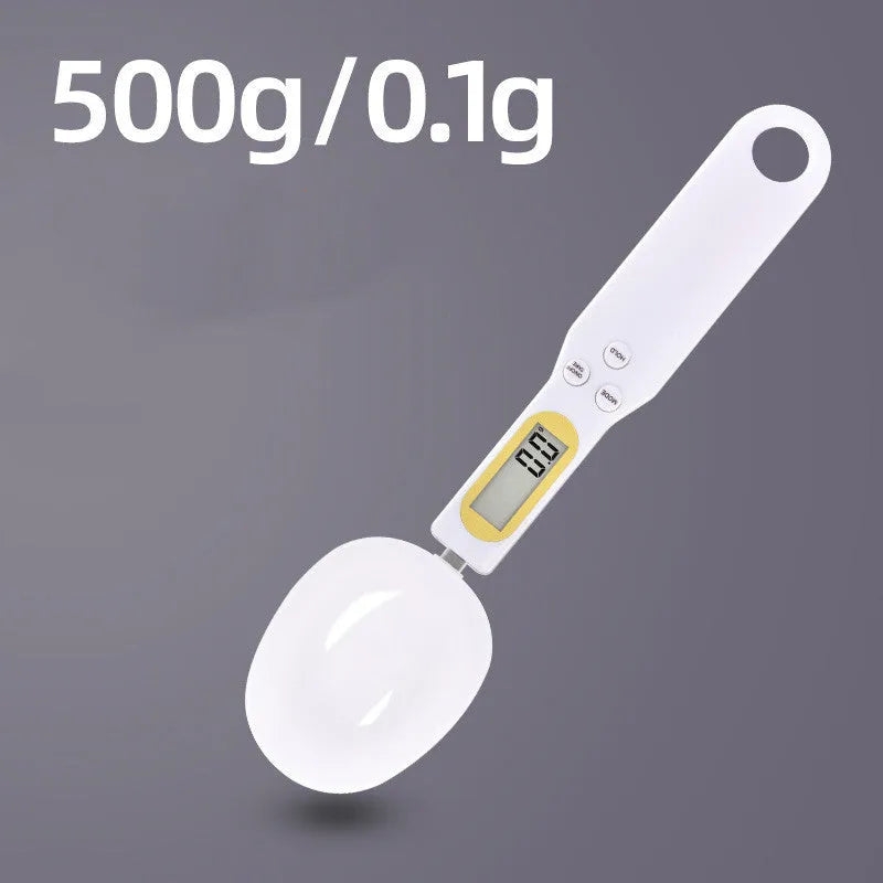 Black electronic measuring spoon scale showing digital display and integrated spoon design for kitchen weighing