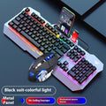Black and white wired keyboard mouse and headset bundle with RGB LED backlighting on desk