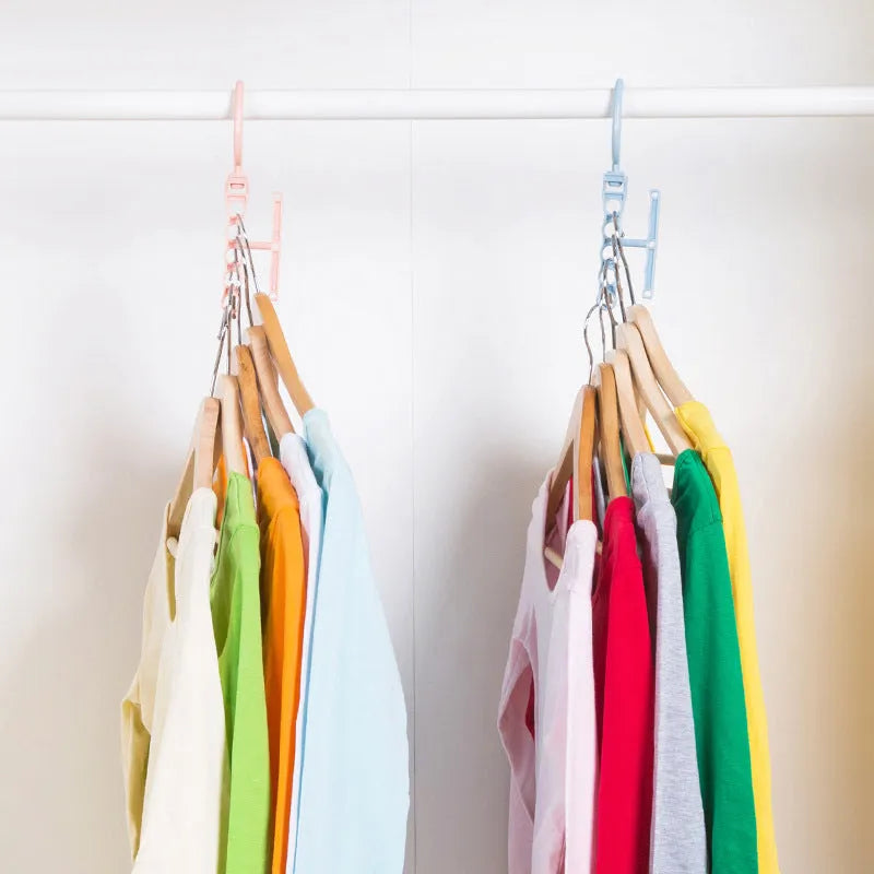 Rotating wardrobe hanger with five holes and handle in blue, green, or pink colour options